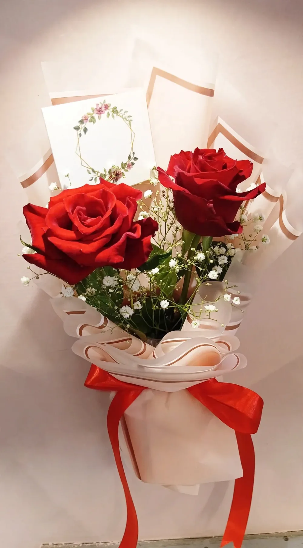 Two Red Roses Bouquet – Close-up – PakFlowerShop