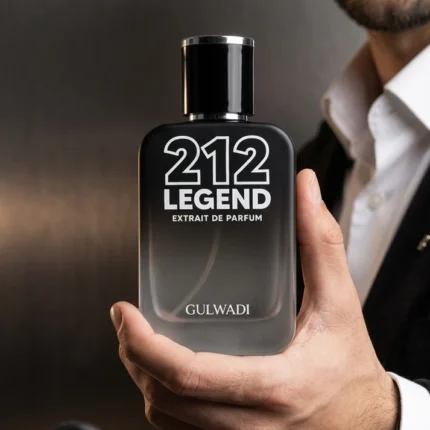 A man in a suit holding a black and grey gradient bottle of 212 Legend Extrait de Parfum by Gulwadi