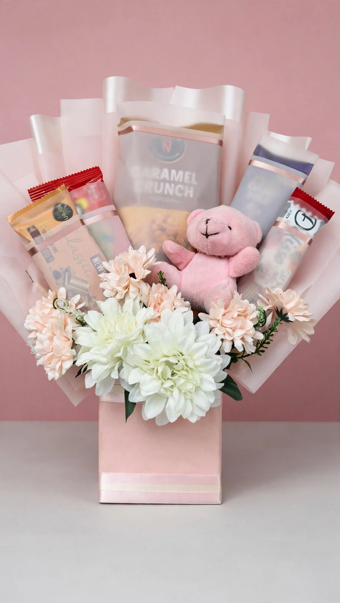 Blush snack gift bag with white chrysanthemums and pink teddy