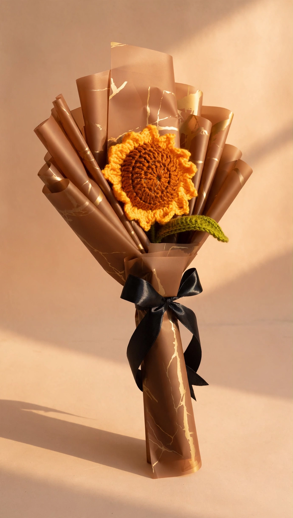 Handmade crochet sunflower bouquet viewed from a three-quarter angle in warm golden light